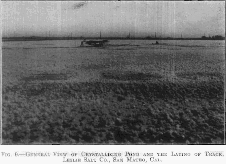 general view of crystallizing pond and the laying of track