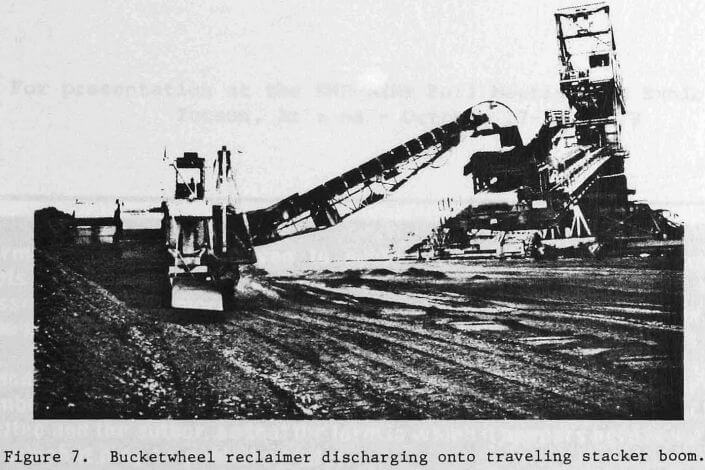 bucketwheel-reclaimer-discharging-onto-traveling-stacker-boom