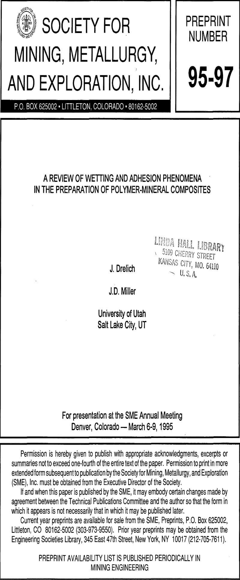 a review of wetting and adhesion phenomena in the preparation of polymer-mineral composites