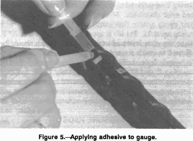 rock-bolt-applying-adhesive-to-gauge