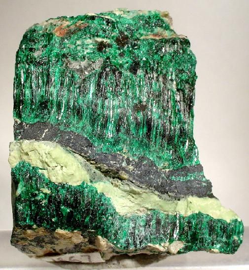 Antlerite (Cu3(SO4)(OH)4) is a moderately soft (3.5-4) mineral with a vitreous luster with a pale green streak. It is found in oxidized copper veins and is therefore a primary copper ore. It is named after its locality, Antler Mine, AZ.: 