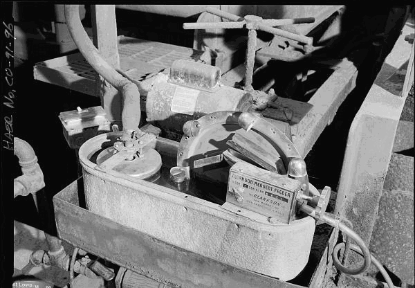 The Clarkson liquid reagent feeder drum and scoop